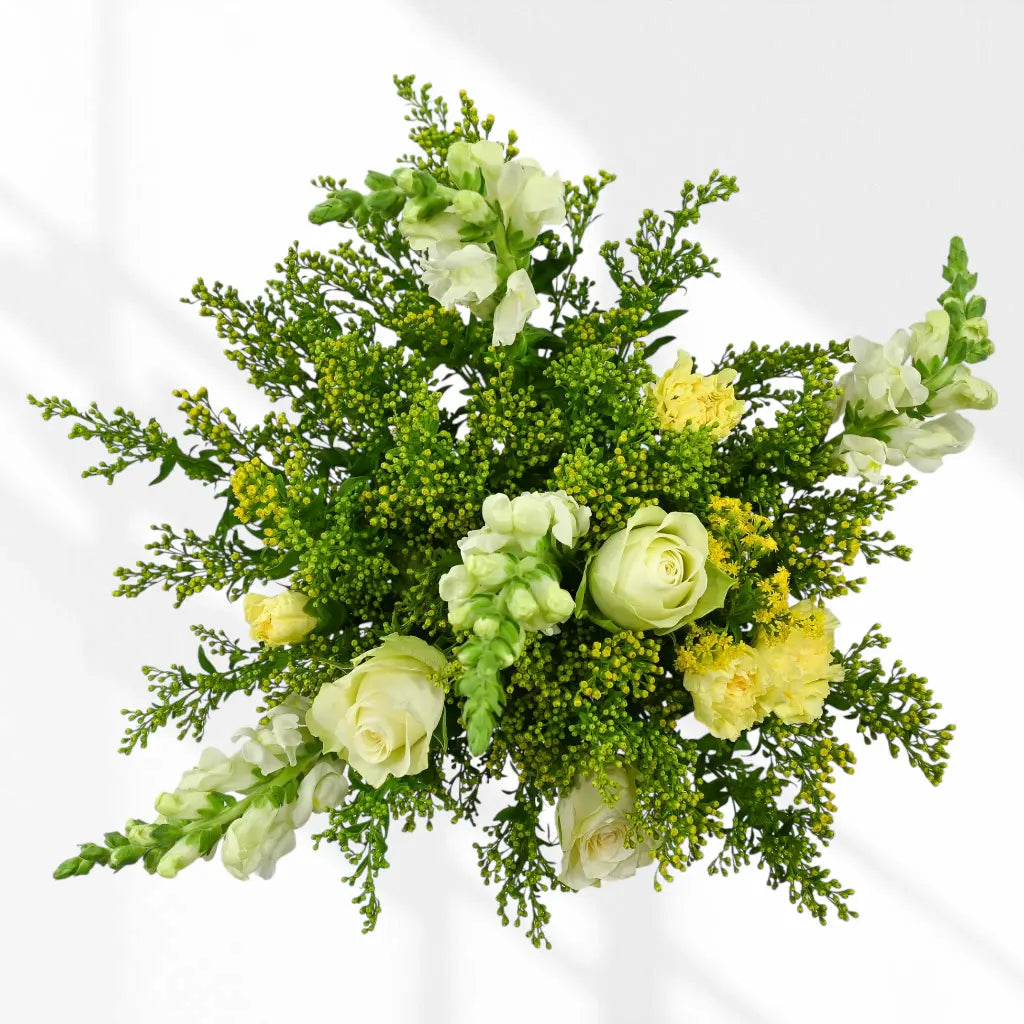 Bouquet of green and yellow flowers on a white background